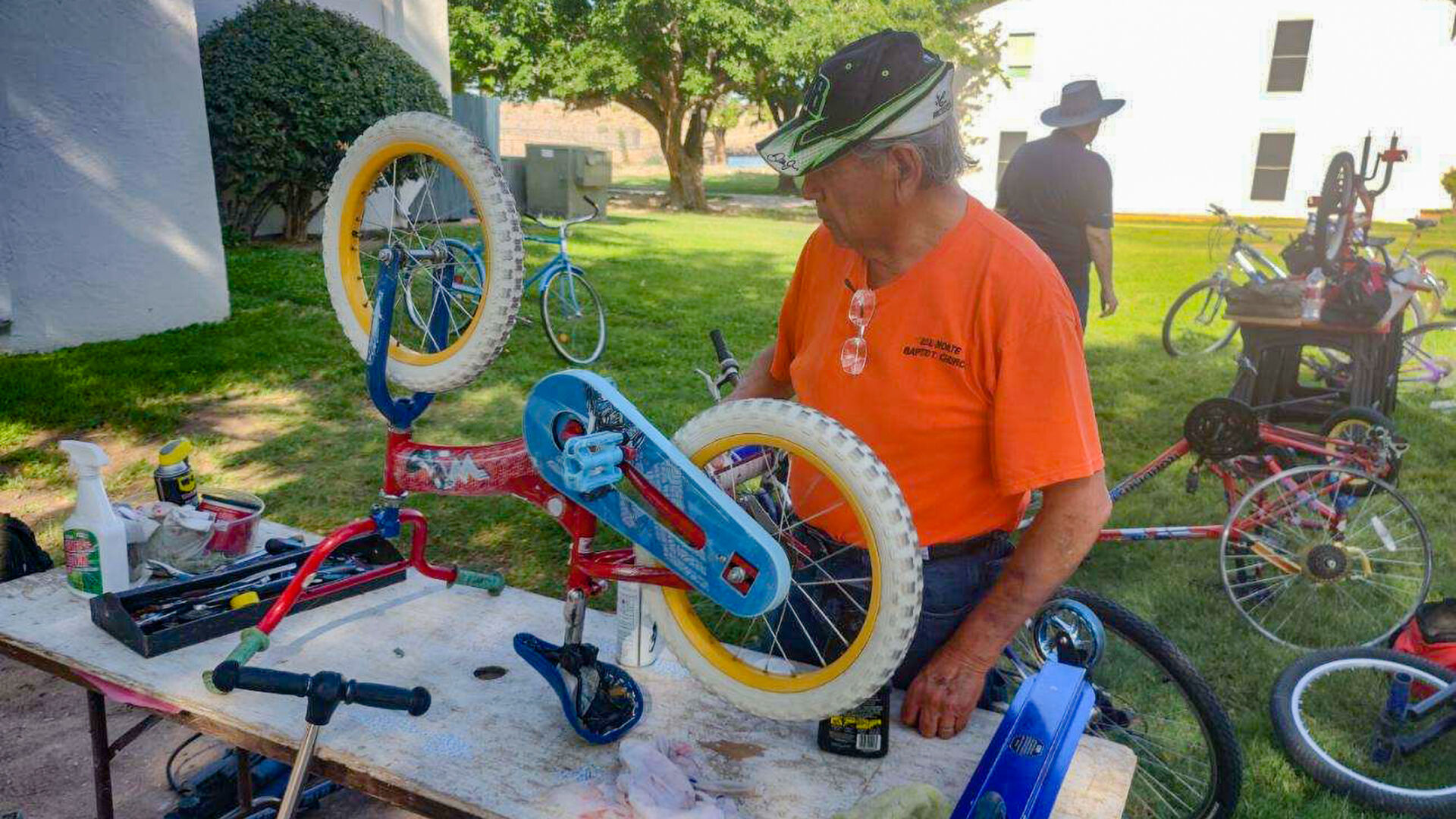 Joe Sandoval Repairing Bike